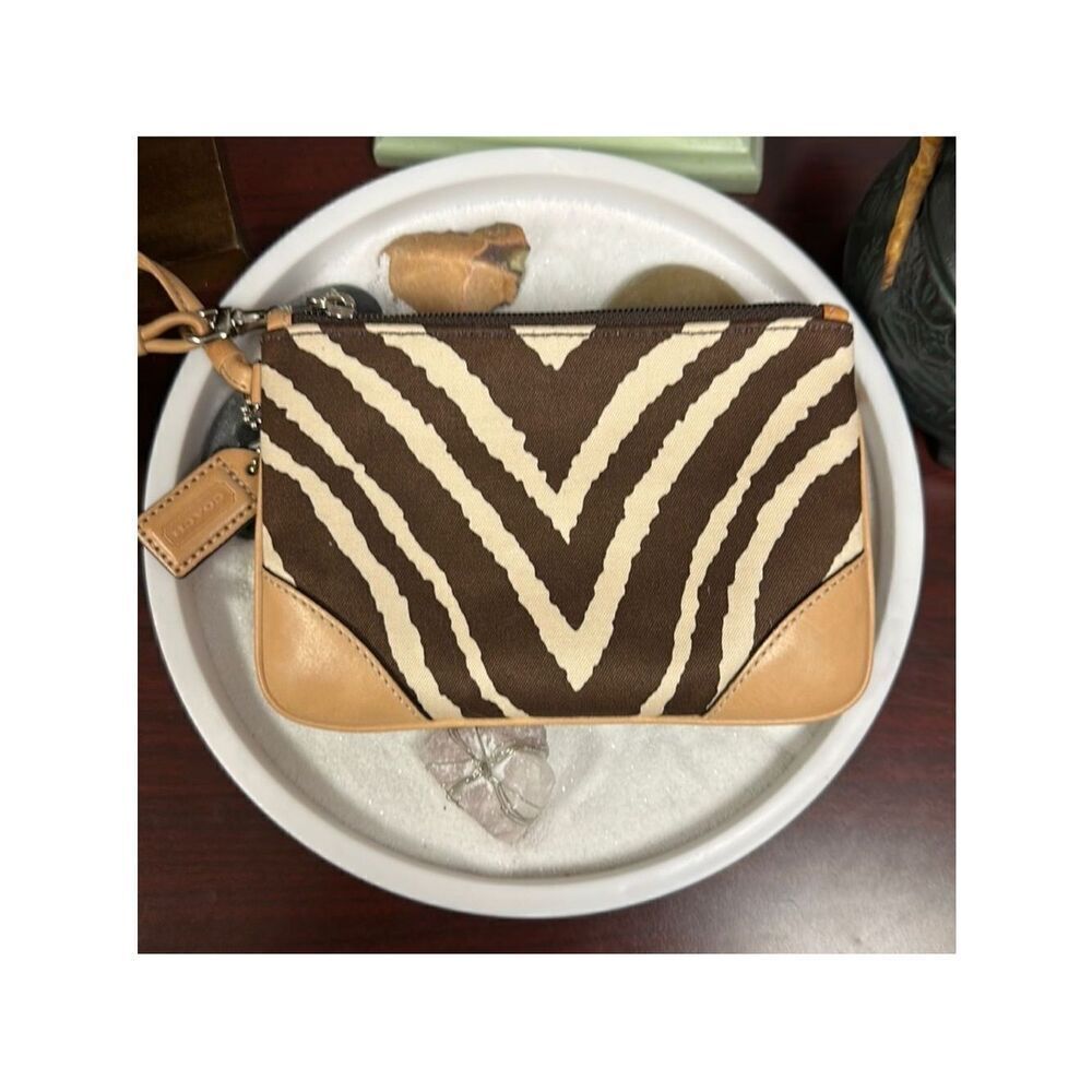 Coach Ivory Brown Animal Print Material Leather Silver Tone Hardware Wristlet